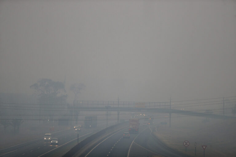 Smoke from wildfires fills the air above the Anhanguera Highway in Ribeirao Preto, Sao Paulo state, Brazil, Sunday, Aug. 25, 2024. (AP Photo/Marcos Limonti)