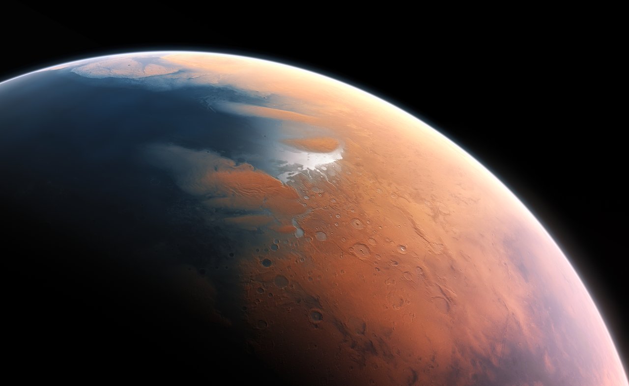 This artist’s impression shows how Mars may have looked about four billion years ago. The young planet Mars would have had enough water to cover its entire surface in a liquid layer about 140 metres deep, but it is more likely that the liquid would have pooled to form an ocean occupying almost half of Mars’s northern hemisphere, and in some regions reaching depths greater than 1.6 kilometres.