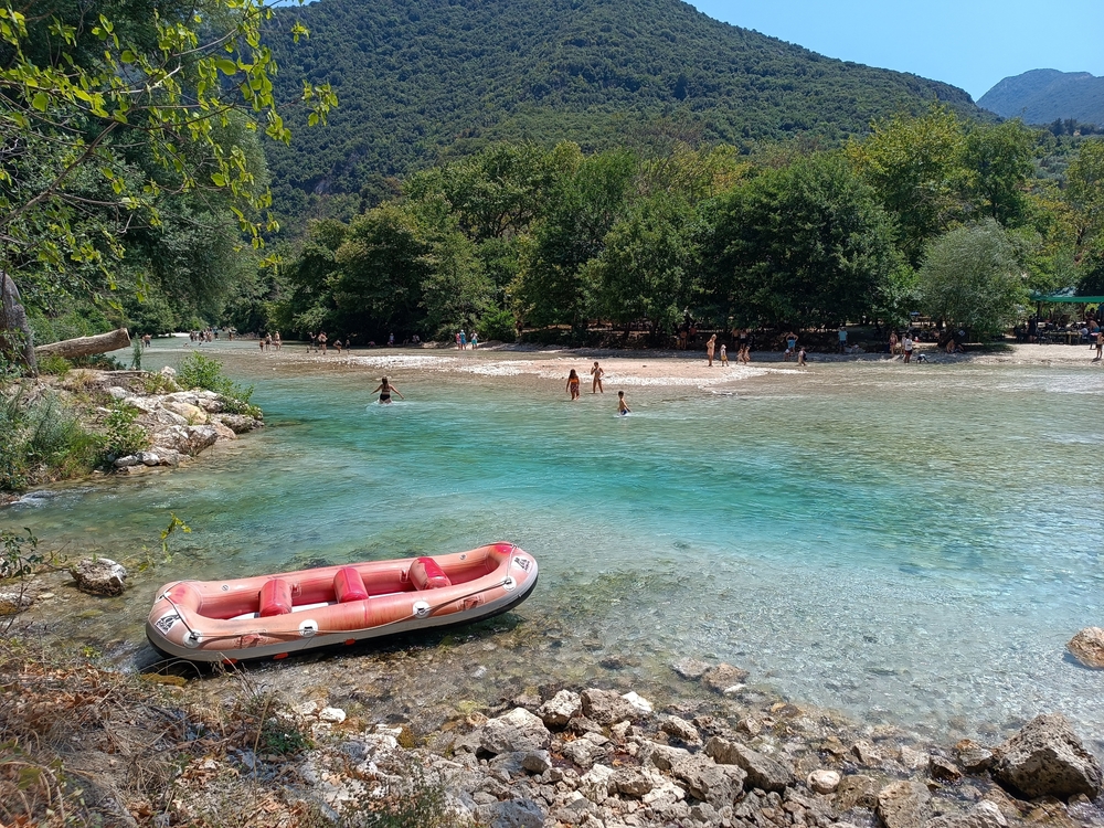 Acheron,River,,Greece-,07.24.24:,A,Red,Boat,In,Acheron,River