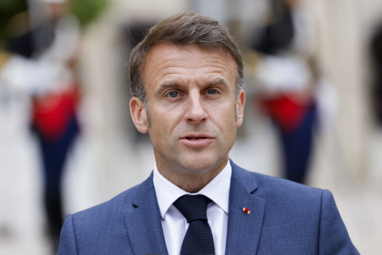 France's President Emmanuel Macron speaks to the media prior to a working lunch with Prime Minister of Portugal at the presidential Elysee Palace, in Paris on June 19, 2024. (Photo by Ludovic MARIN / AFP)