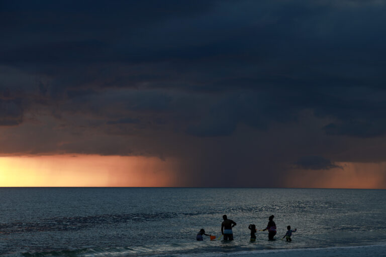 ST. PETE BEACH, FLORIDA - SEPTEMBER 2: Storm clouds are seen on the horizon as the sun sets on September 24, 2024 in St. Pete Beach, Florida. Tropical Storm Helene is forecast to become a major hurricane, bringing a potential for deadly storm surge, flooding rain, and destructive hurricane-force winds along parts of the Florida West coast. Helene is expected to make landfall in Florida on Thursday.   Joe Raedle/Getty Images/AFP (Photo by JOE RAEDLE / GETTY IMAGES NORTH AMERICA / Getty Images via AFP)