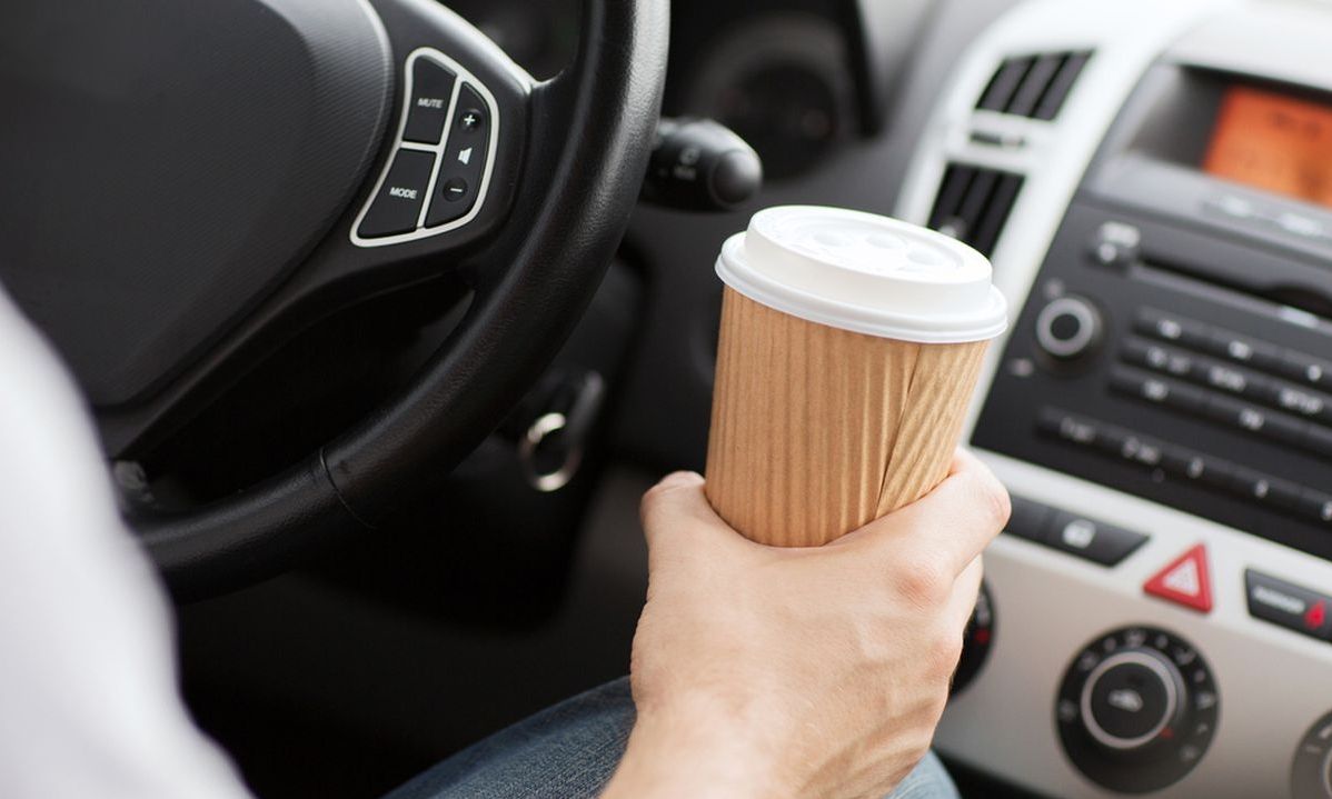 c26b7183-coffee-car-driving