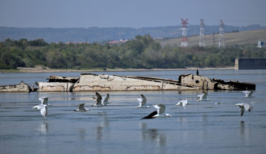 This photograph shows the remains of the German tugboat wreckage marked as UJ-106 in the Danube near the village of Prahovo, Serbia, on August 26, 2024. On September 6, 1944, the Nazi army, pursued by the Red Army, sank hundreds of ships in the Danube. 80 years later, the fleet is about to rise from the waters - much to the chagrin of Serbian fishermen who have been casting their nets there for decades. (Photo by OLIVER BUNIC / AFP)