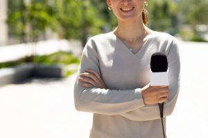 woman-holding-microphone-interview