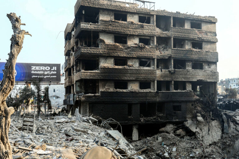 A destroyed building sits near a crater at the site of an overnight Israeli airstrikes that targeted a Beirut's southern suburb on October 10, 2024. The United States urged its ally Israel to avoid Gaza-like military action in Lebanon, after Prime Minister Benjamin Netanyahu said it could face "destruction" like the Palestinian territory. (Photo by AFP)