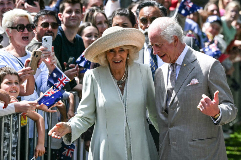 Britain's King Charles III and Queen Camilla greet people after attending a Sunday morning service at St Thomas' Anglican Church in Sydney on October 20, 2024, during their six-day royal visit to Sydney and Canberra. (Photo by Saeed KHAN / AFP)