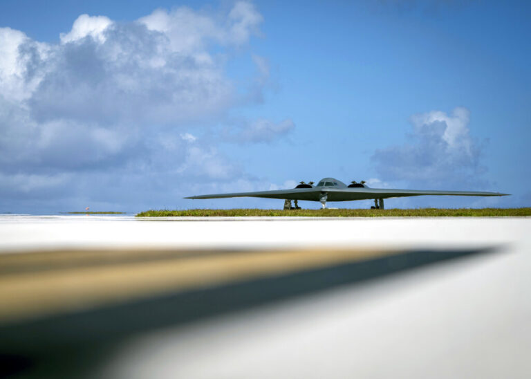 FILE- In this Jan. 8, 2018, file photo, released by the U.S. Air Force, a B-2 Spirit, assigned to the 509th Bomb Wing, Whiteman Air Force Base, taxis on the flightline at Andersen Air Force Base (AFB), Guam. President Donald Trump is raising a large chunk of the money for his border wall with Mexico by deferring several large military construction projects slated for the strategically important Pacific outpost of Guam. This may disrupt plans to move Marines to Guam from Japan and to modernize important munitions storage for the Air Force. About 7% of the funds for the $3.6 billion wall are being diverted from eight projects in U.S. territory. (Staff Sgt. Joshua Smoot/U.S. Air Force via AP)