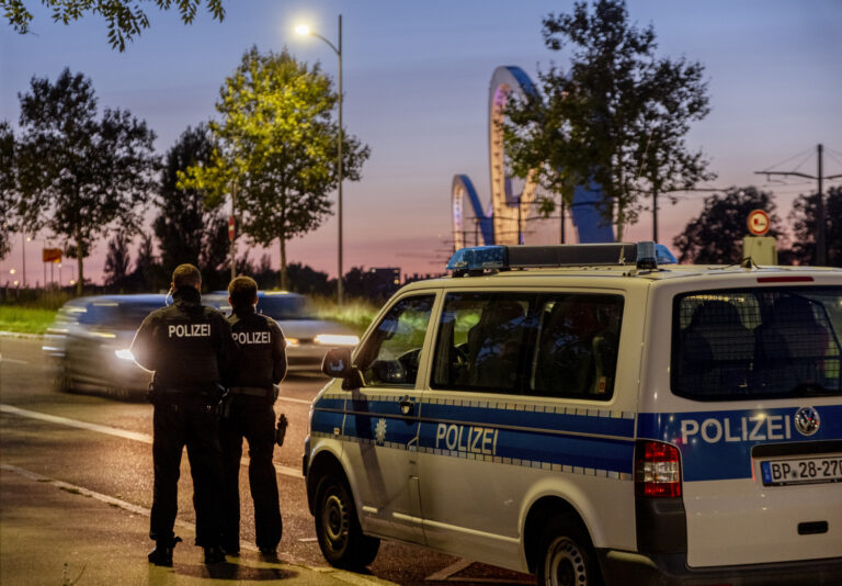 German police officers stand at the border between Germany and France in Kehl, Germany, Sunday, Sept. 15, 2024. (AP Photo/Michael Probst)