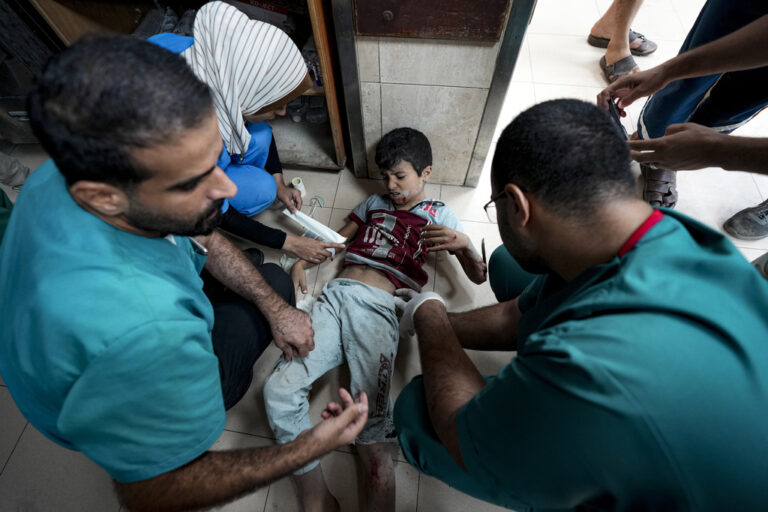 A Palestinian child wounded in the Israeli bombardment of the Gaza Strip is treated in a hospital in Deir al-Balah, Monday, Sept. 30, 2024. (AP Photo/Abdel Kareem Hana)