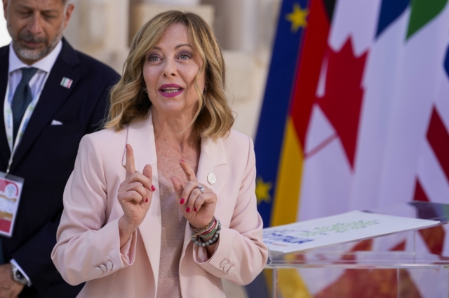 Italian Prime Minister Giorgia Meloni arrives to a G7 world leaders summit at Borgo Egnazia, Italy, Thursday, June 13, 2024. (AP Photo/Luca Bruno)