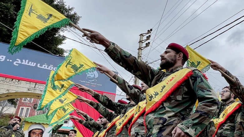 Fighters of the Lebanese Shiite group Hezbollah parade during a ceremony to commemorate the party's fallen leaders in the Lebanese village of Jibshit, about 50 kilometres south of the capital Beirut on February 15, 2024. (Photo by MAHMOUD ZAYYAT / AFP)