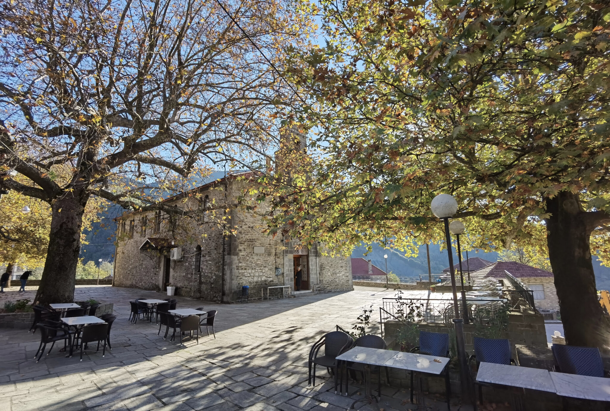 Kypseli,Village,Central,Square,In,Autumn,Season,Tables,Chairs,Plane