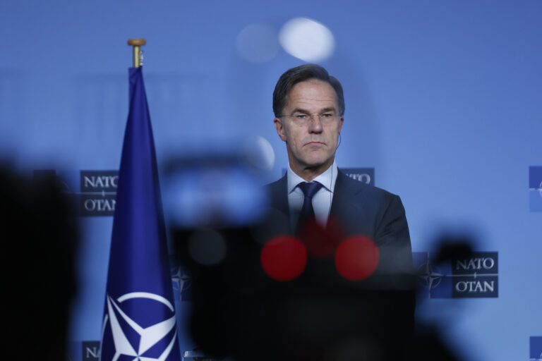 NATO Secretary General Mark Rutte delivers a statement during a joint press conference with Romanian Prime Minister Ion Marcel Ciolacu before a meeting at NATO headquarters in Brussels on Monday, Nov. 18, 2024. (AP Photo/Omar Havana)