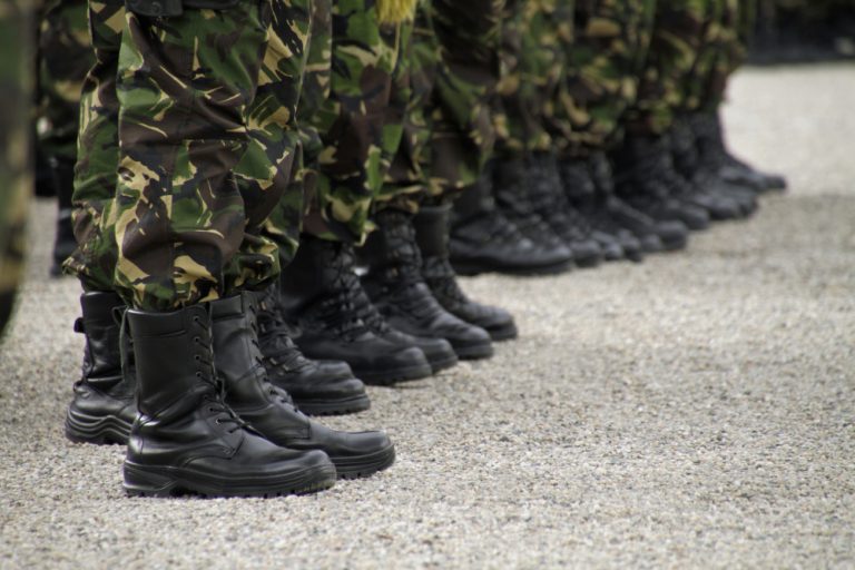 selective-focus-shot-soldiers-standing-line