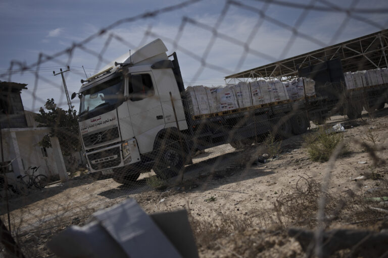 Trucks with humanitarian aid for the 'Gaza Strip enter from Egypt in Rafah on Saturday, Oct. 21, 2023. (AP Photo/Fatima Shbair)