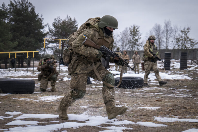 New recruits practice on a military training ground in Chernihiv region, Ukraine, Thursday, Dec. 5, 2024. (AP Photo/Dan Bashakov)