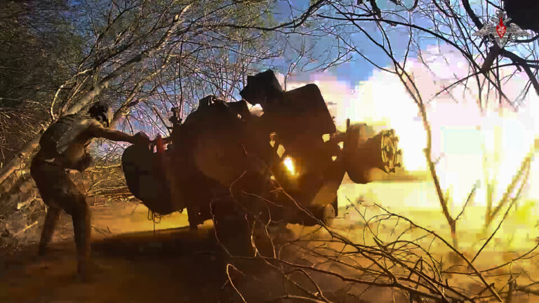 FILE - In this image from video released by the Russian Defense Ministry on Oct. 17, 2024, a Russian soldier fires a gun toward a Ukrainian position in the Russian-Ukrainian border area in ​​the Kursk region, Russia. (Russian Defense Ministry Press Service photo via AP, File)