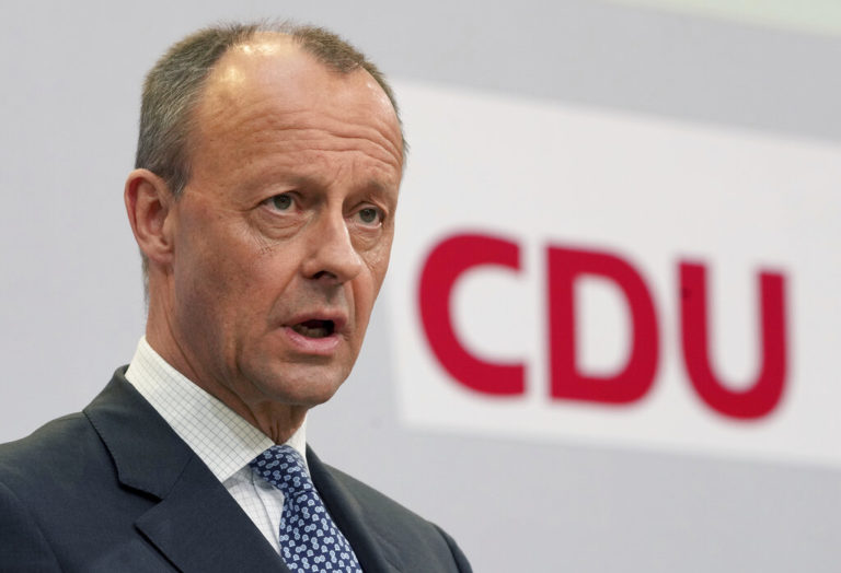 The Chairman of the German Christian Democratic Party (CDU), Friedrich Merz, addresses the media during a press conference at the party's headquarters in Berlin, Germany, Monday, March 28, 2022 the day after the state elections in the German state of Saarland. (AP Photo/Michael Sohn, pool)