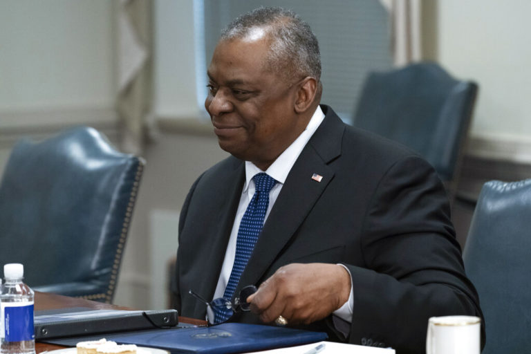 Secretary of Defense Lloyd Austin smiles after speaking during a meeting with Philippines Secretary of National Defense Delfin Lorenzana at the Pentagon, Monday, April 18, 2022, in Washington. (AP Photo/Alex Brandon)