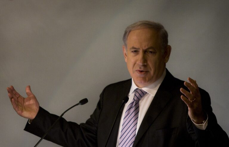 Israeli Prime Minister Benjamin Netanyahu gestures as he speaks in the Jewish People Policy Institute's annual conference in Jerusalem, Friday, Oct. 22, 2010. (AP Photo/Sebastian Scheiner)