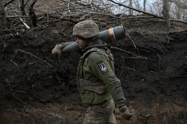 An artilleryman of the 155th Separate Mechanized Brigade of Ukrainian Armed Forces prepares to fire a French-made Caesar self-propelled howitzer toward Russian positions at an undisclosed location in the Donetsk Region on January 6, 2025, amid the Russian invasion of Ukraine. On the front line, French-trained men of the 155th Anne de Kiev Brigade, fighting two enemies: the Russians and the scandals eating away at their unit. Named after a Kiev princess who became Queen of France in the Middle Ages, and launched with great fanfare by President Emmanuel Macron, the brigade was supposed to be a showcase for the military partnership between Ukraine and France. (Photo by Genya SAVILOV / AFP)