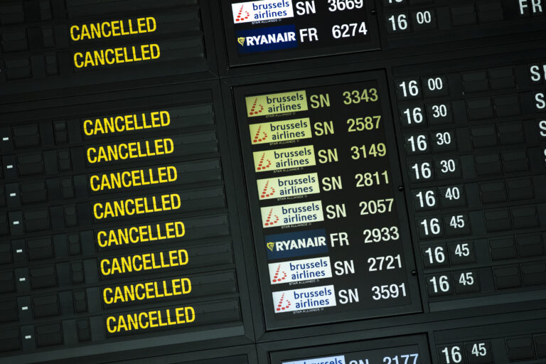 FILE - In this Tuesday, May 12, 2020 file photo, a departure timetable board displays cancelled flights at Brussels Airport in Brussels. Brussels Airlines reported Thursday, March 4, 2021 a loss of 293 million euros in the financial year 2020 mainly due to travel disruptions linked to the coronavirus pandemic.(AP Photo/Francisco Seco, File)