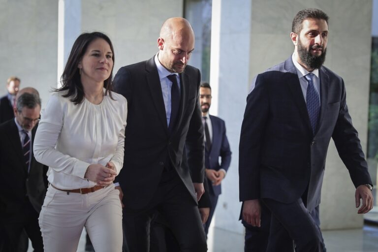 In this photo released by the Syrian official news agency SANA, Syria's de facto leader Ahmad al-Sharaa, formerly known as Abu Mohammed al-Golani, right, meets with German foreign minister, Annalena Baerbock, left, and French foreign minister, Jean-Noel Barrot, center, in Damascus, Syria, Friday, Jan. 3, 2025. (SANA via AP)