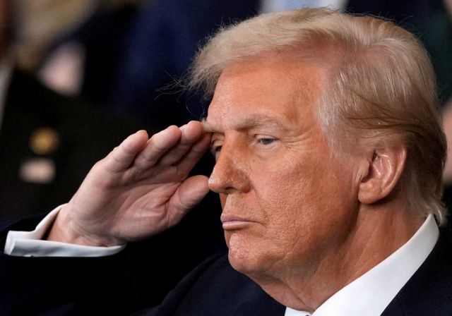 President Donald Trump listens to Christopher Macchio sing during the 60th Presidential Inauguration in the Rotunda of the U.S. Capitol in Washington, Monday, Jan. 20, 2025.     Julia Demaree Nikhinson/Pool via REUTERS     TPX IMAGES OF THE DAY