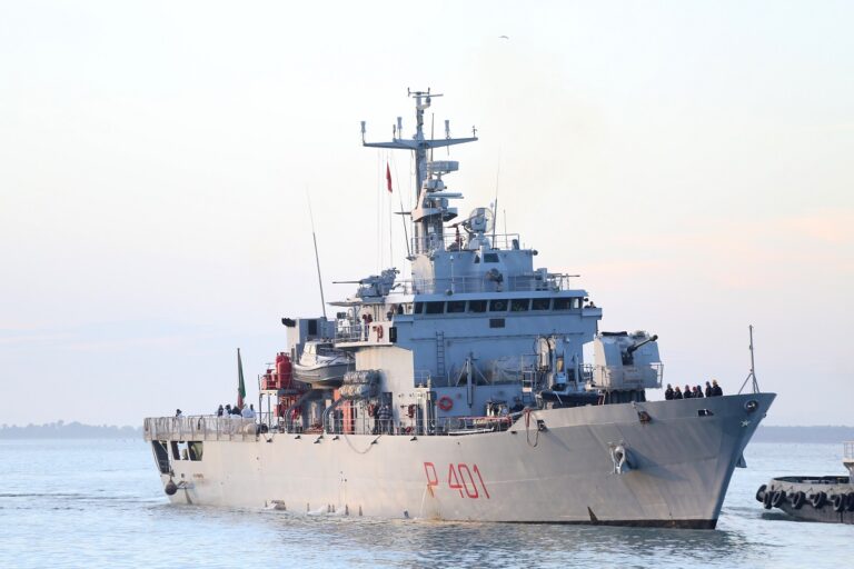 epa11857537 Italian Navy patrol vessel 'Cassiopea', carrying a group of migrants who were rescued over the weekend in international waters south of Lampedusa, arrives in the port of Shengjin, Albania, 28 January 2025. Under the Italy-Albania deal, Italy has sent a group of 49 migrants to reception centers in Albania in a plan aimed at deterring sea crossings by processing asylum claims outside the European Union (EU). The initiative faced legal setbacks after Italian courts ruled that migrants could not be held in Albania due to concerns over their legal status. In response, the Italian government adjusted the legal framework, hoping this would strengthen the policy, which allows up to 3,000 non-vulnerable men to be housed temporarily in Italian-run facilities in Albania.  EPA/MALTON DIBRA