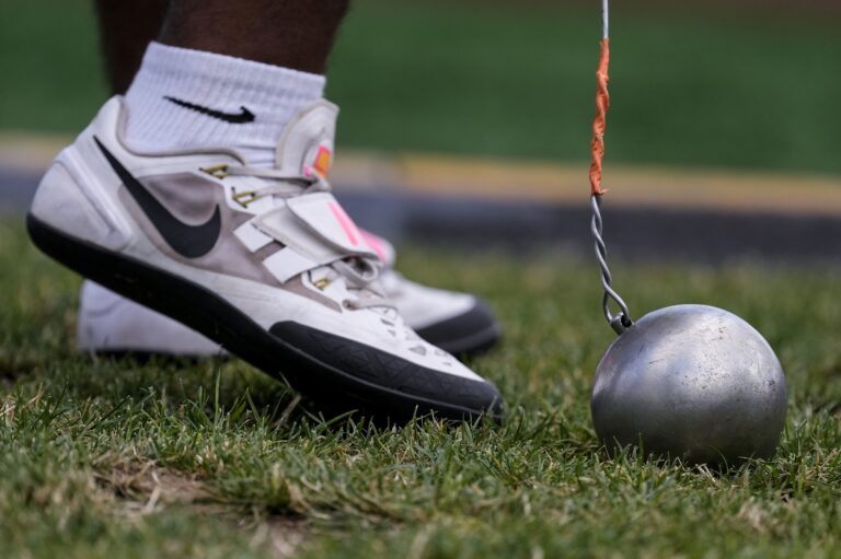 Tarik O'Hagan holds his hammer before competing in the men's hammer throw final during the U.S. Track and Field Olympic Team Trials, Sunday, June 30, 2024, in Eugene, Ore. (AP Photo/George Walker IV)