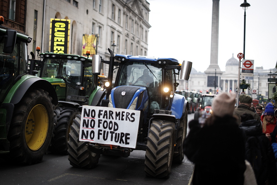 epa11886620 British farmers gridlock Whitehall with their tractors during a protest over changes to inheritance tax (IHT) rules, in London, Britain, 10 February 2025. British farmers demand a reversal of the changes to inheritance tax rules announced in the October 2024 budget by the Labour government, which will introduce new taxes on farms worth more than 1 million GBP that would apply from April 2026.  EPA/TOLGA AKMEN