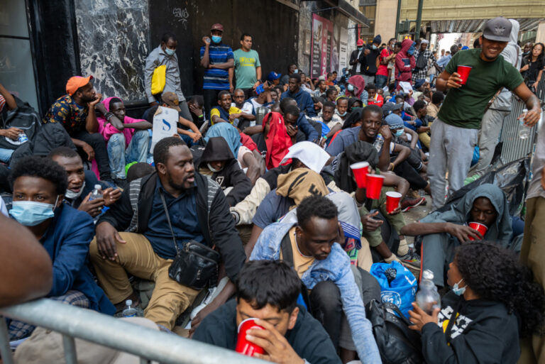 NEW YORK, NEW YORK - AUGUST 01: Dozens of recently arrived migrants to New York City camp outside of the Roosevelt Hotel, which has been made into a reception center, as they try to secure temporary housing on August 01, 2023 in New York City. The migrants, many from Central America and Africa, have been sleeping on the streets or at other shelters as the city continues to struggle with the influx of migrants whose numbers have surged this spring and summer.   Spencer Platt/Getty Images/AFP (Photo by SPENCER PLATT / GETTY IMAGES NORTH AMERICA / Getty Images via AFP)