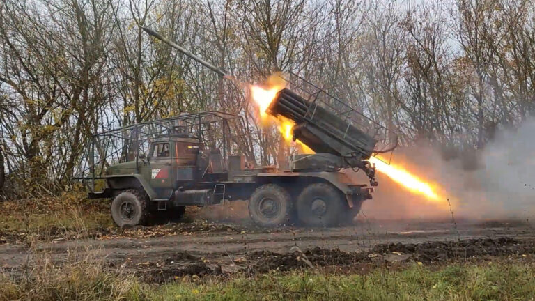 In this photo taken from video released by the Russian Defense Ministry on Tuesday, Dec. 3, 2024, a "Grad" self-propelled 122 mm multiple rocket launcher fires toward Ukrainian position in the Russian - Ukrainian border area in ​​the Kursk region, Russia. (Russian Defense Ministry Press Service photo via AP)