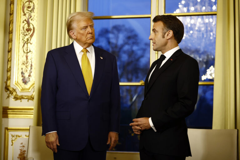 FILE - President-elect Donald Trump, left, attends a meeting with France's President Emmanuel Macron at the Elysee Palace in Paris, Dec. 7, 2024. (Sarah Meyssonnier/Pool via AP, File)