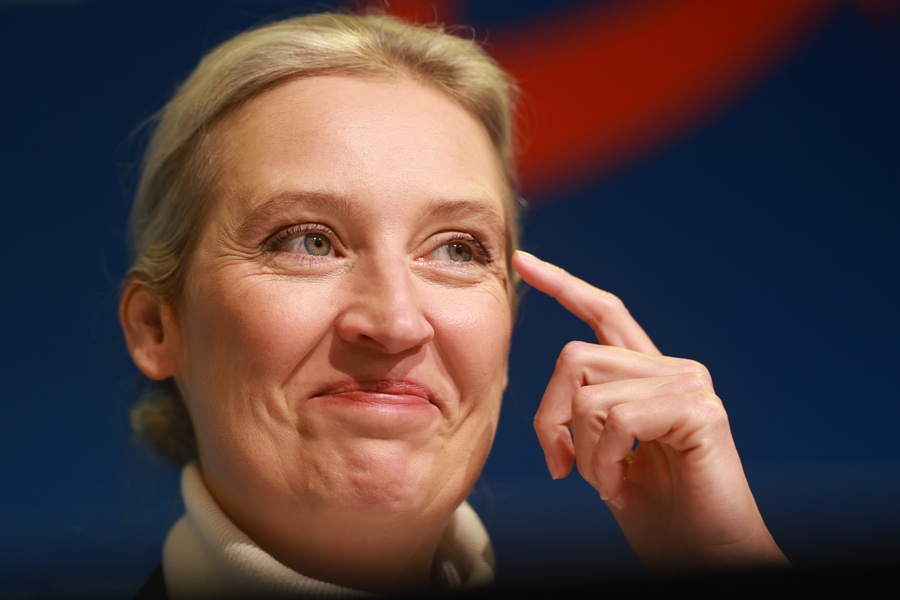 epa11761909 Alternative for Germany (AfD) party and faction co-chairwoman and top candidate for the federal election Alice Weidel looks on during a press conference of the Alternative for Germany (AfD) in Berlin, Germany, 07 December 2024. The Alternative for Germany (AfD) party held a press conference to present their Chancellor candidate ahead of the upcoming German federal election.  EPA/CLEMENS BILAN