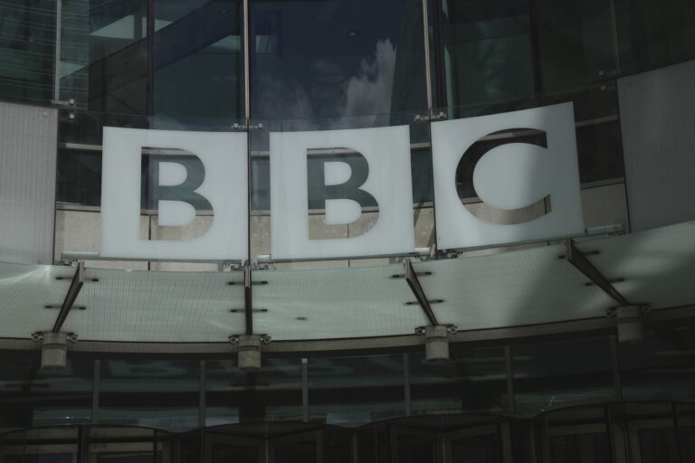 FILE - A logo of the BBC marks the BBC Headquarters in London, Britain, July 11, 2023. (AP Photo/Kin Cheung, File)