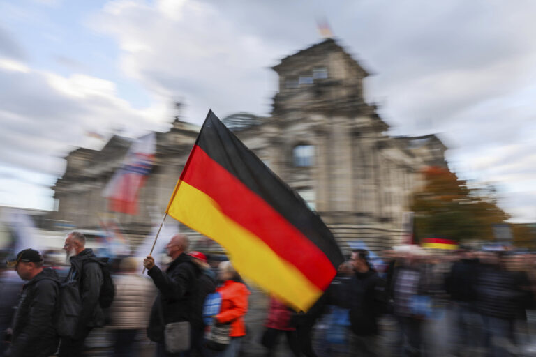 In this image released on Friday, January, 31, 2025, Germany elects a new Bundestag on February 23. The issue of migration plays a particularly important role, not least for supporters of the far-right AfD party - seen here at a demonstration in front of the Reichstag building in Berlin, the seat of the Bundestag, in 2022. HANDOUT IMAGE - Please see Special Instructions. Press release and media available to download at www.apmultimedianewsroom.com/newsaktuell. (Democracy News Alliance/news aktuell via AP Images)