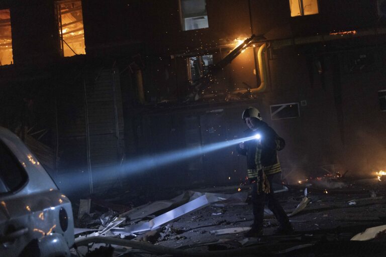 Firefighters extinguish a fire after a Russian attack on a civil factory in Kharkiv, Ukraine, on Tuesday, Jan. 28, 2025. (AP Photo/Yevhen Titov)